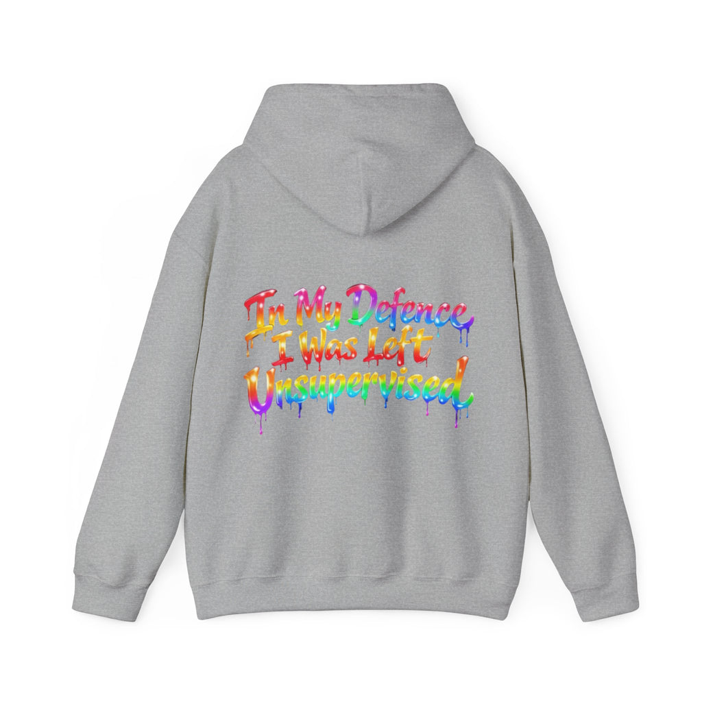 Adult Hoodie — "In My Defence I Was Left Unsupervised" Colorful Drip Graphic