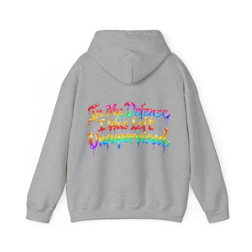Adult Hoodie — "In My Defence I Was Left Unsupervised" Colorful Drip Graphic